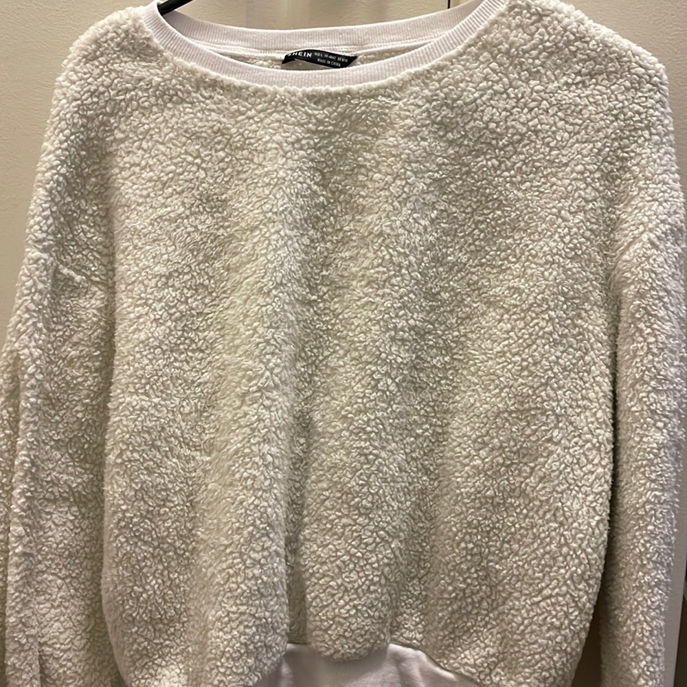 Fluffy white sweater